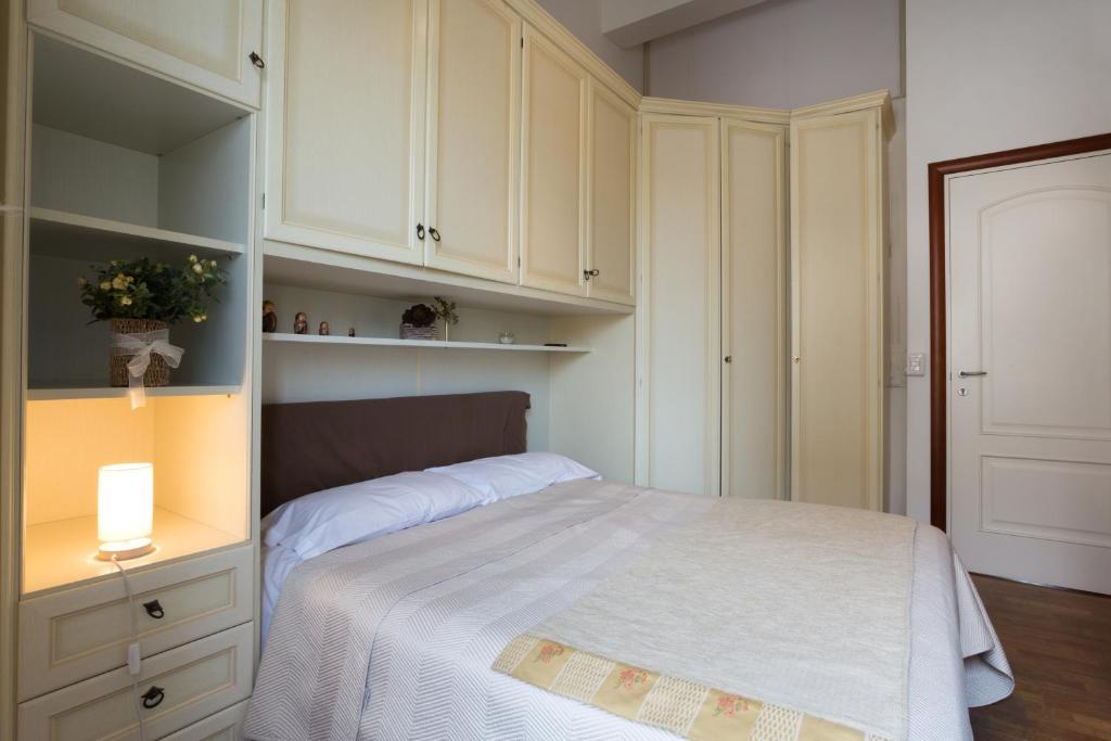 Posteľ alebo postele v izbe v ubytovaní B&B Ortigia Bedda
