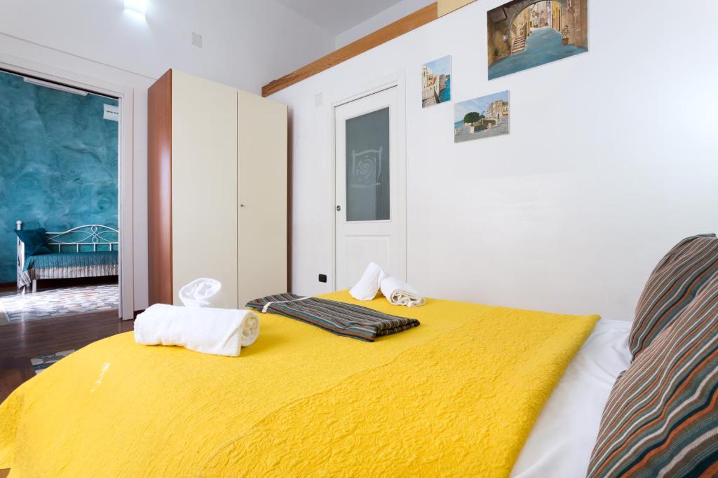 Posteľ alebo postele v izbe v ubytovaní B&B Ortigia Bedda