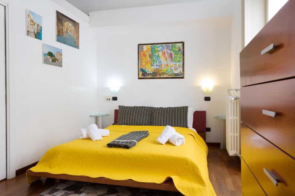 Posteľ alebo postele v izbe v ubytovaní B&B Ortigia Bedda
