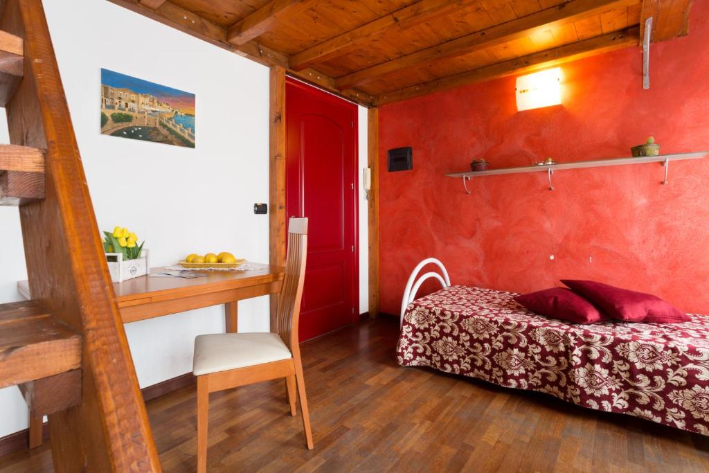 Posteľ alebo postele v izbe v ubytovaní B&B Ortigia Bedda