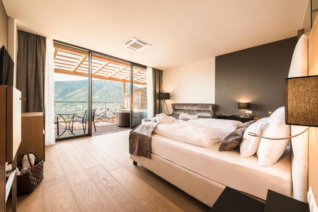 Postel nebo postele na pokoji v ubytování Boutique Hotel Eschenlohe
