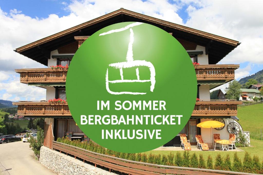 un círculo verde con las palabras en el instituto Somener Bergdalitzer inclusive en Gästehaus Etschmann, en Riezlern