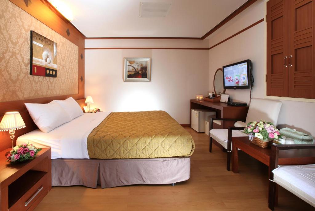 Postel nebo postele na pokoji v ubytování Incheon Airporthotel Airstay