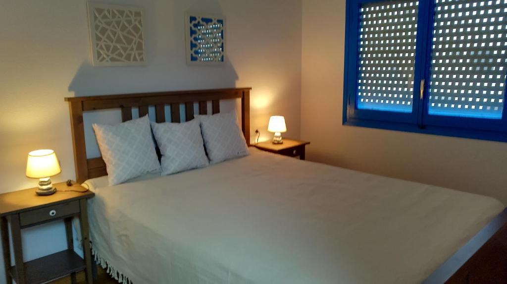 Posteľ alebo postele v izbe v ubytovaní Apartament Virginia