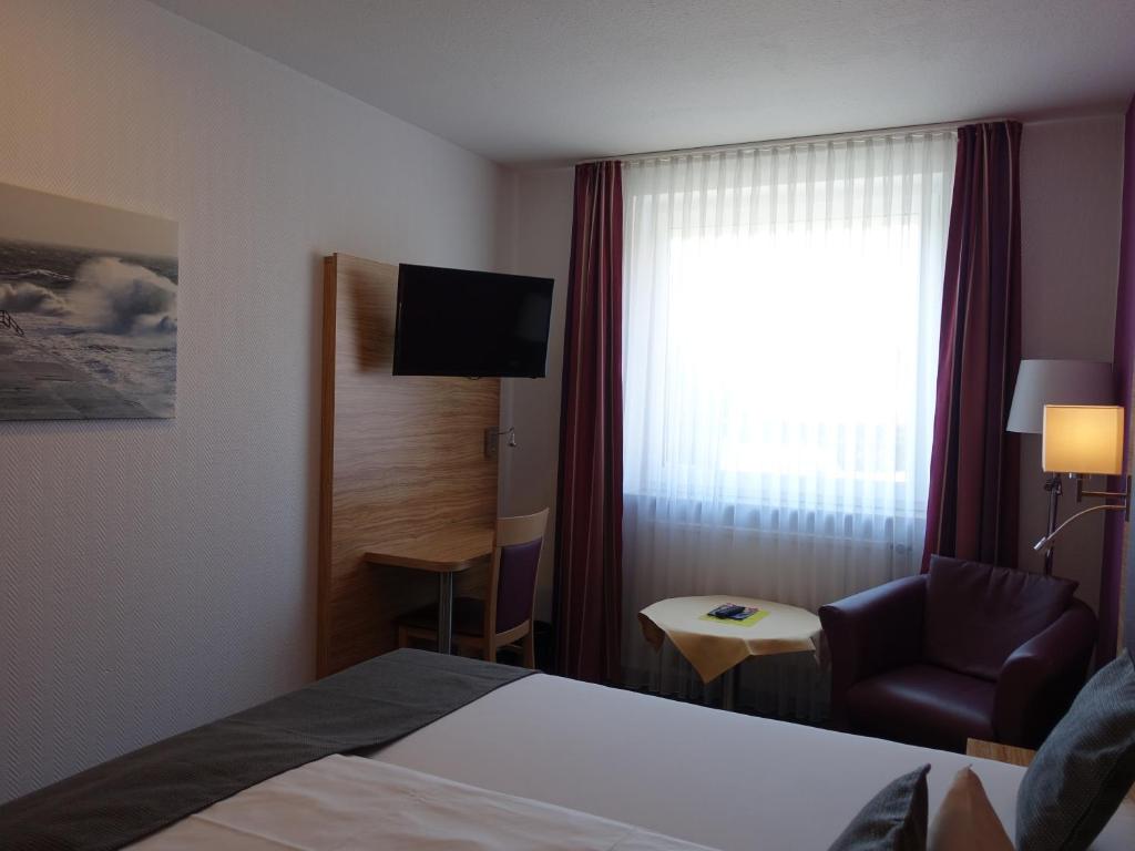 TV a/nebo společenská místnost v ubytování Hotel Prinz Heinrich