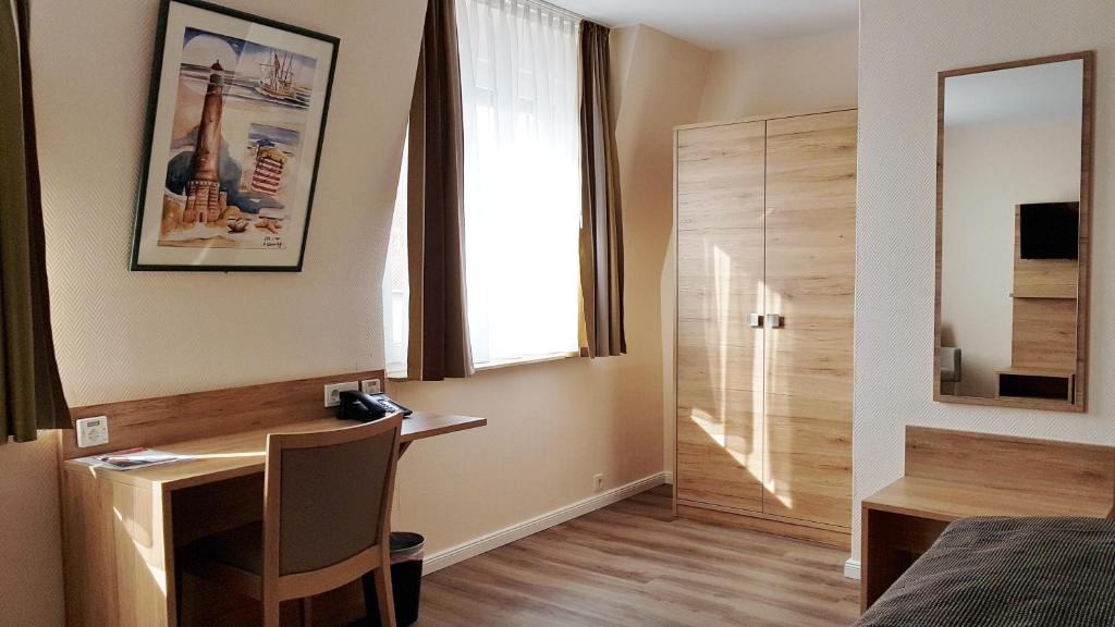 TV a/nebo společenská místnost v ubytování Hotel Prinz Heinrich