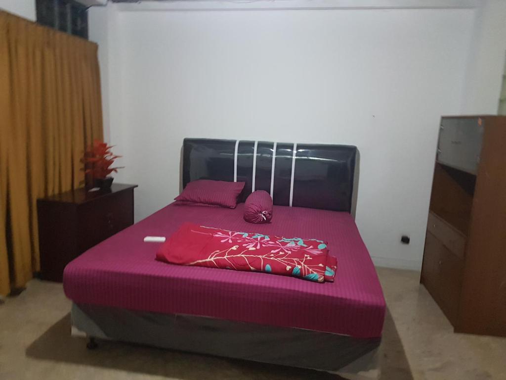 Postel nebo postele na pokoji v ubytování Mayestik Guest House Syariah