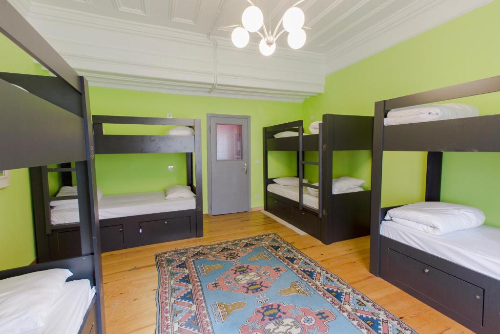 Postel nebo postele na pokoji v ubytování Cheers Hostel