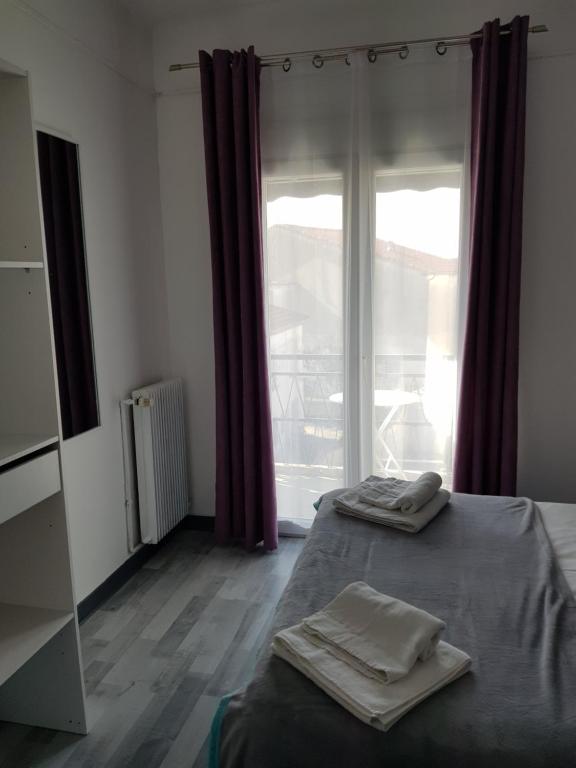 Postel nebo postele na pokoji v ubytování Hôtel l'Etoile