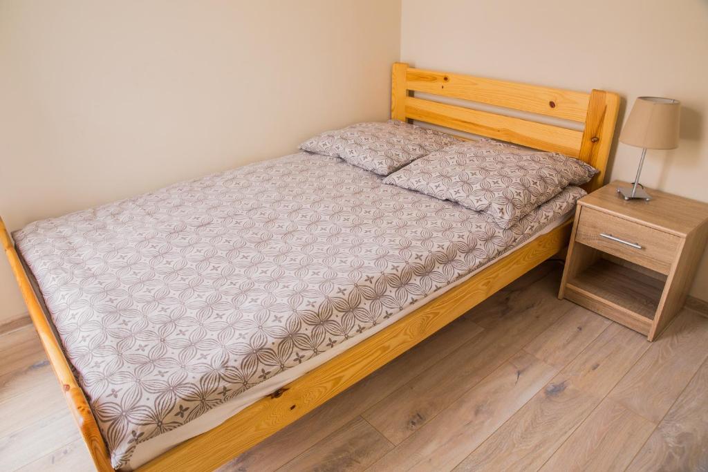 Posteľ alebo postele v izbe v ubytovaní Family Homes - Apartamenty Sonoma