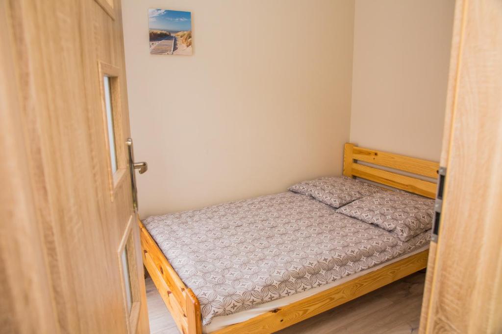 Posteľ alebo postele v izbe v ubytovaní Family Homes - Apartamenty Sonoma