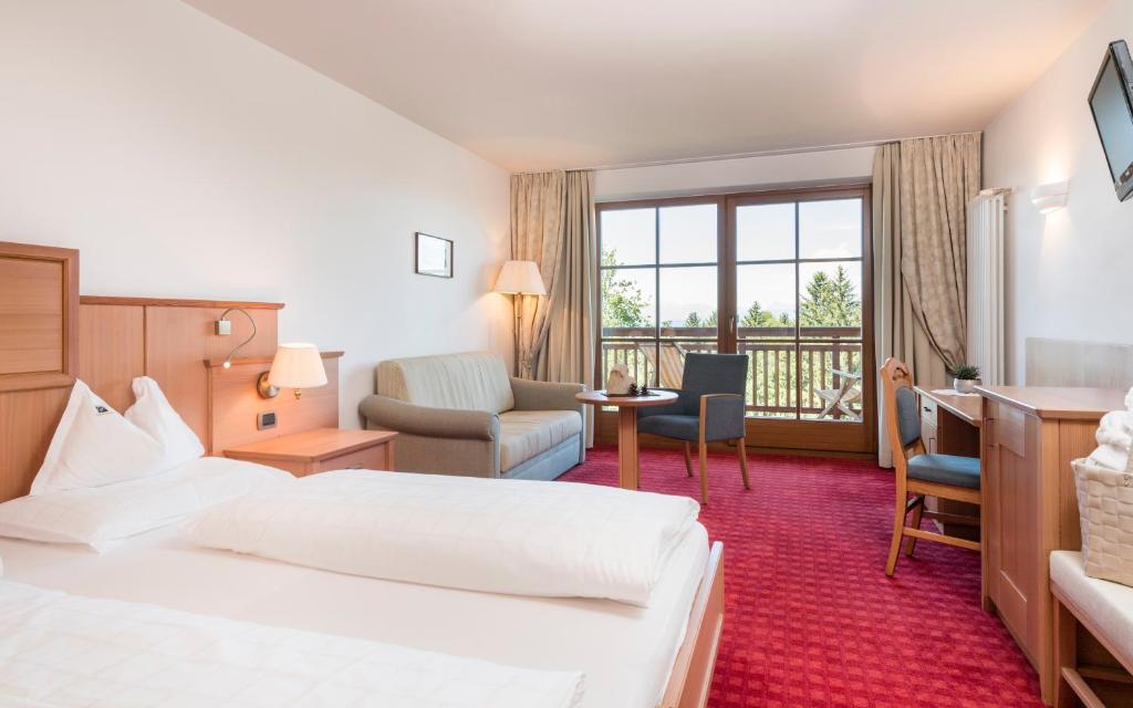 Postel nebo postele na pokoji v ubytování Hotel Peter