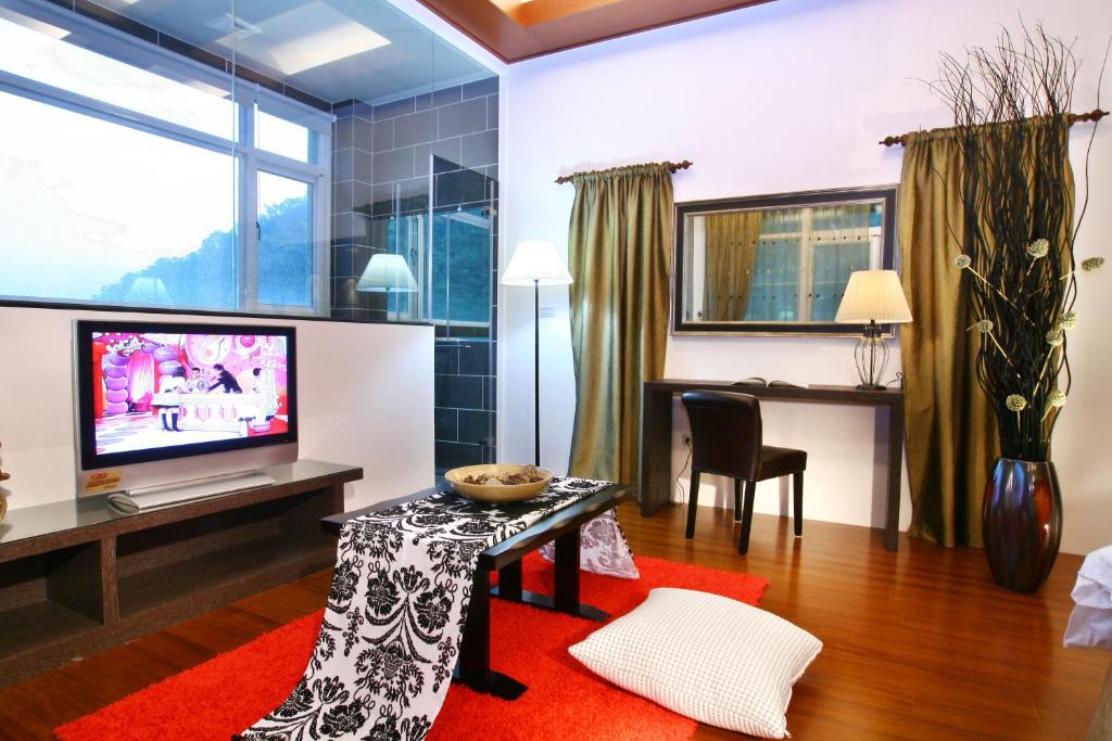 TV a/nebo společenská místnost v ubytování Shan Quan Zhi Lian Homestay