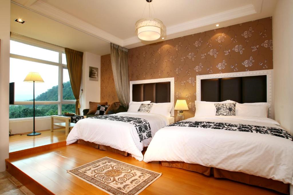 Postel nebo postele na pokoji v ubytování Shan Quan Zhi Lian Homestay