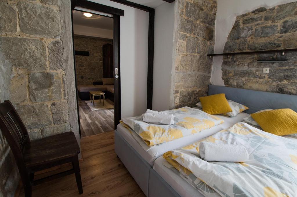 Postel nebo postele na pokoji v ubytování Elena Rooms