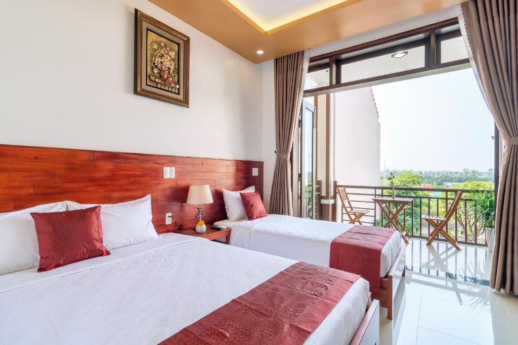 Giường trong phòng chung tại Gia Phát Homestay