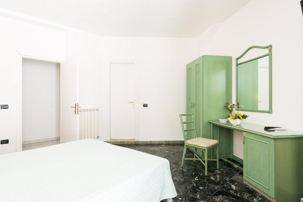 Postel nebo postele na pokoji v ubytování B&B Verde