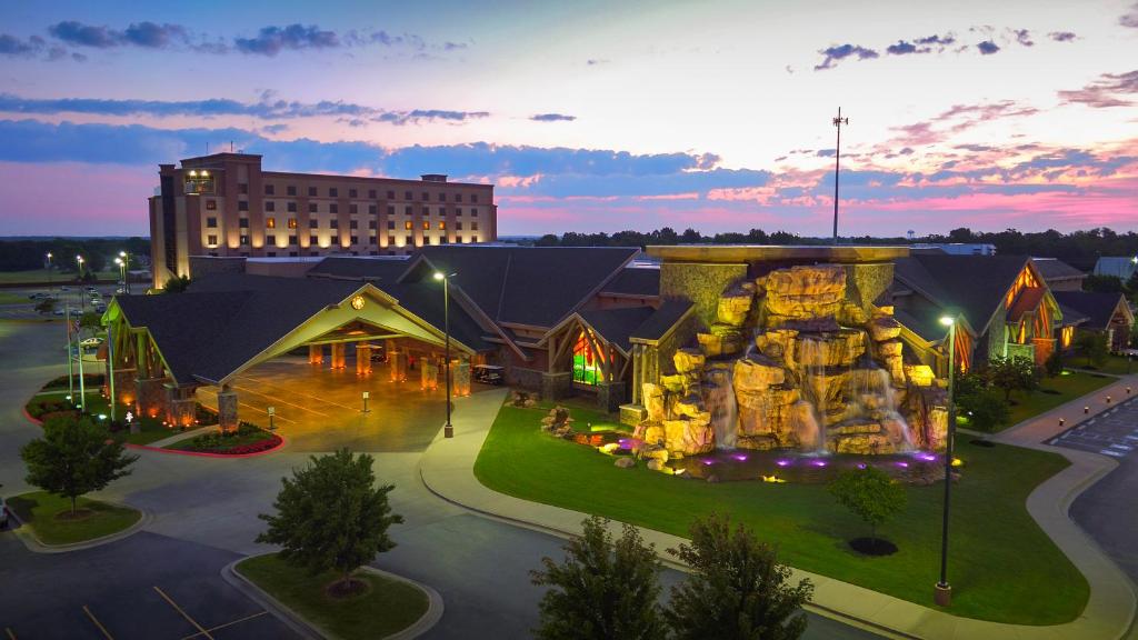 an aerial view of a building with a large playground at Cherokee Casino West Siloam Springs Resort in West Siloam Springs