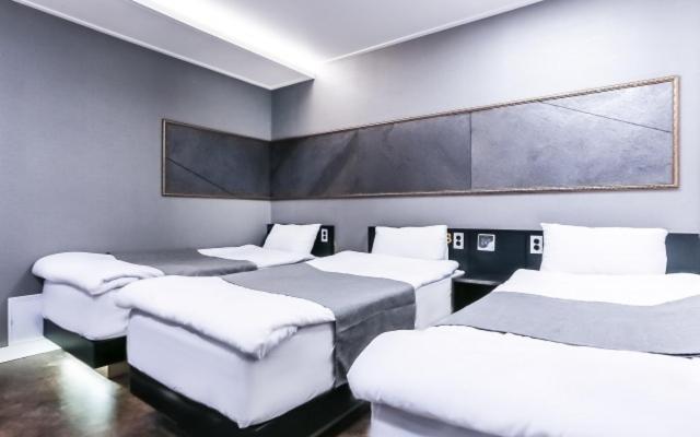 Postel nebo postele na pokoji v ubytování Major Hotel 2