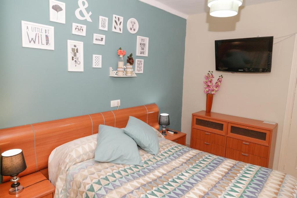 Cama o camas de una habitación en Pension Internacional