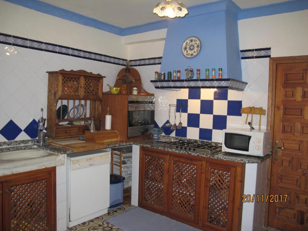 Kuchnia lub aneks kuchenny w obiekcie Cortijo Los Nogales