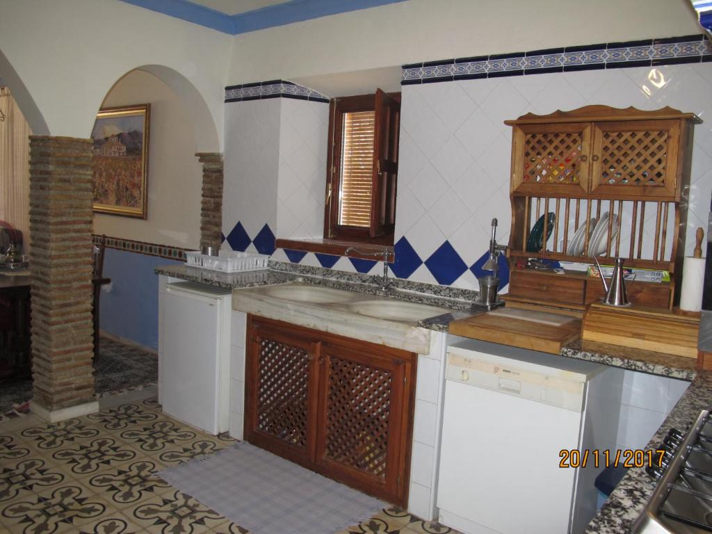 Kuchnia lub aneks kuchenny w obiekcie Cortijo Los Nogales