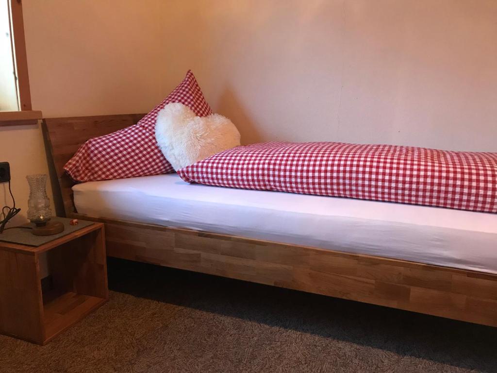 Postel nebo postele na pokoji v ubytování Chalet & Almhostel Alpenperle - Selbstversorger Unterkunft