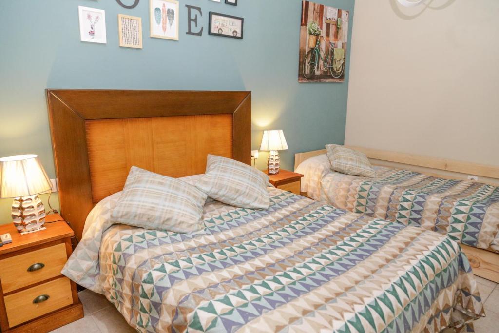 Cama o camas de una habitación en Pension Internacional