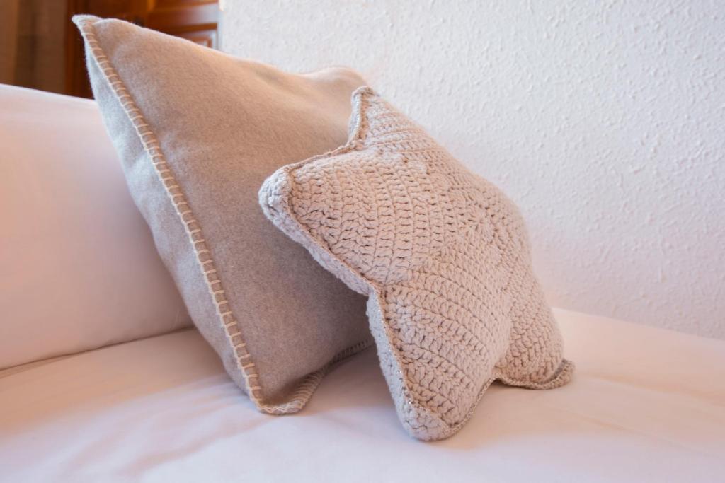 Postel nebo postele na pokoji v ubytování B&B La Lluna