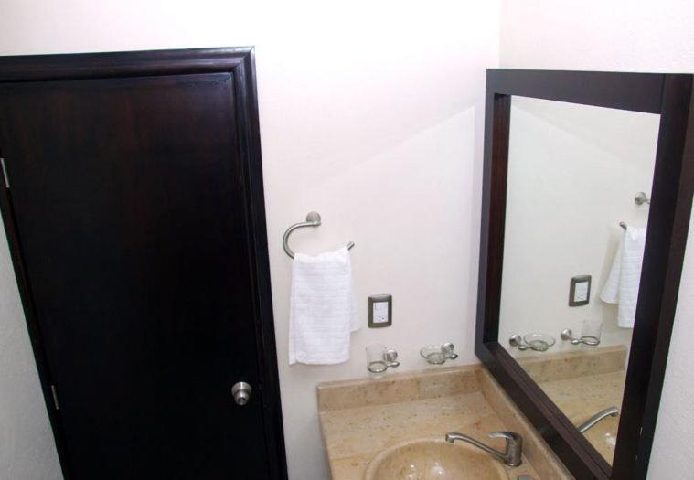Koupelna v ubytování MR Hotel