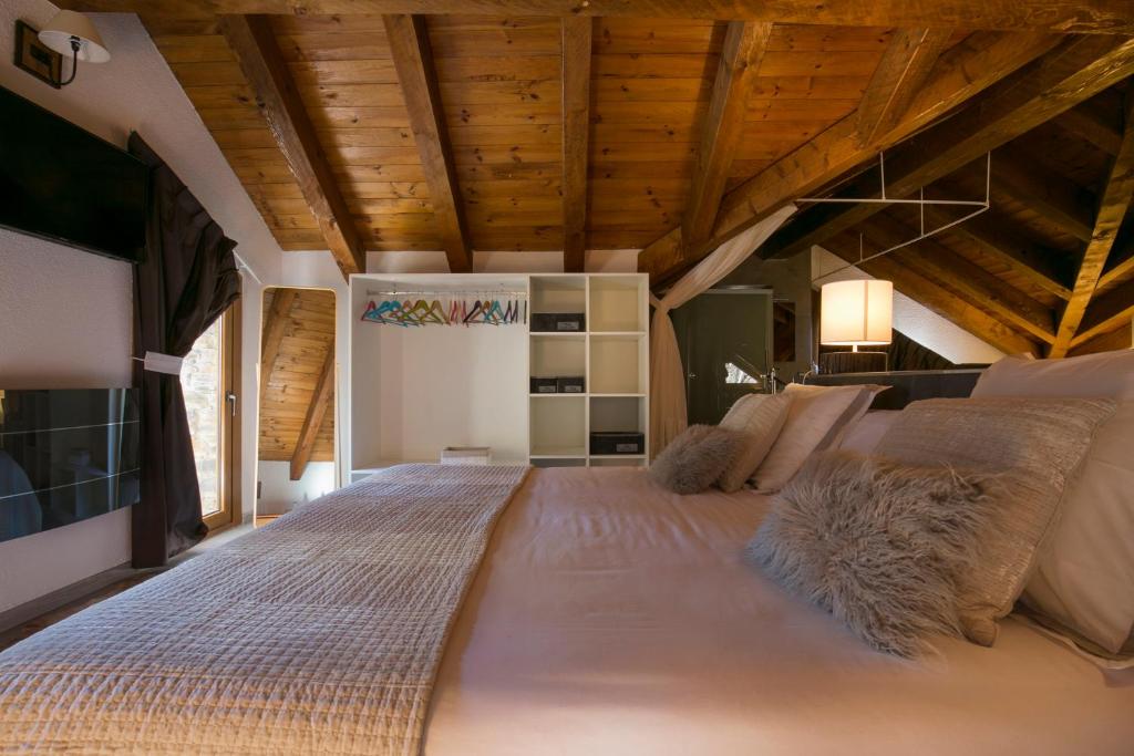 Postel nebo postele na pokoji v ubytování B&B La Lluna