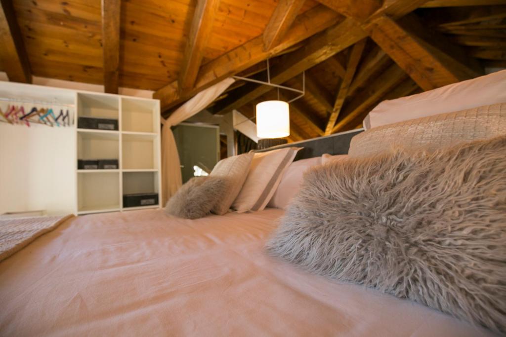 Postel nebo postele na pokoji v ubytování B&B La Lluna