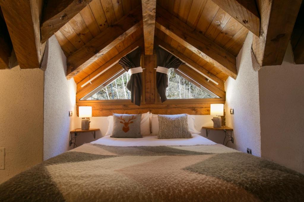Postel nebo postele na pokoji v ubytování B&B La Lluna