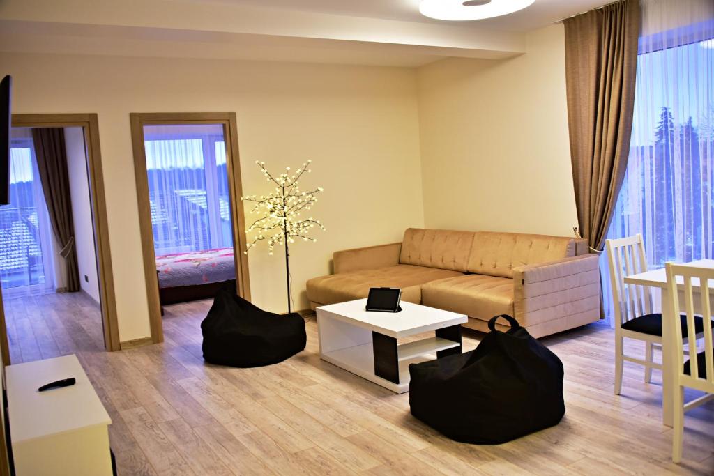 Posezení v ubytování Ąžuolo apartamentai