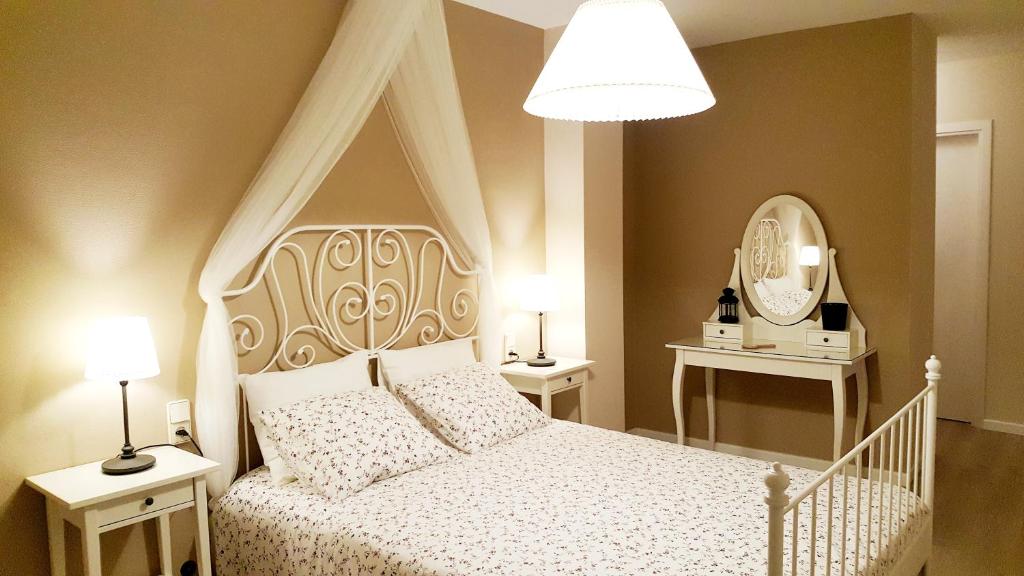Posteľ alebo postele v izbe v ubytovaní Apartamento DACTONIUM - Ribeira Sacra