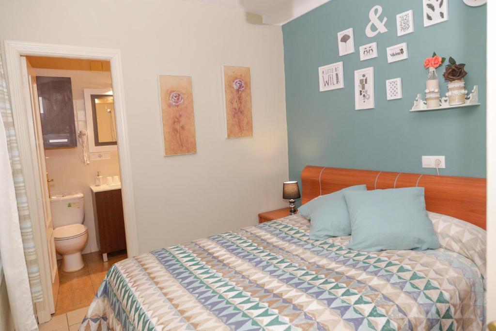 Cama o camas de una habitación en Pension Internacional