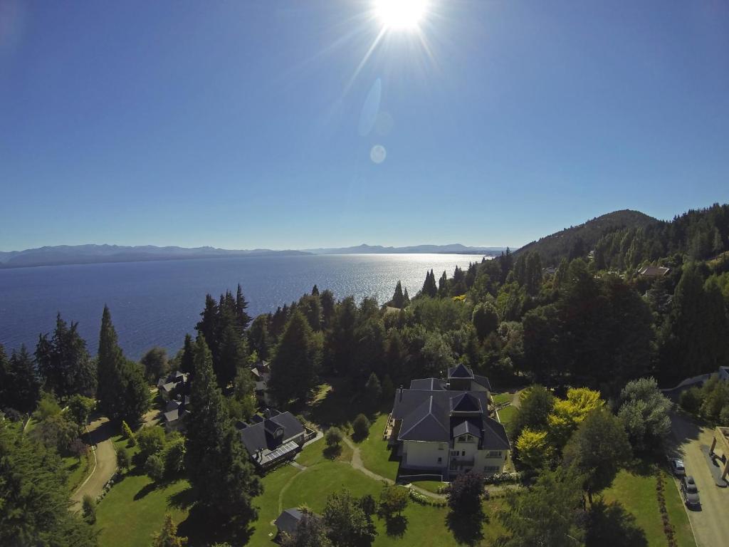 
a view from a balcony overlooking a lake at Huinid Cabañas Bustillo in San Carlos de Bariloche
