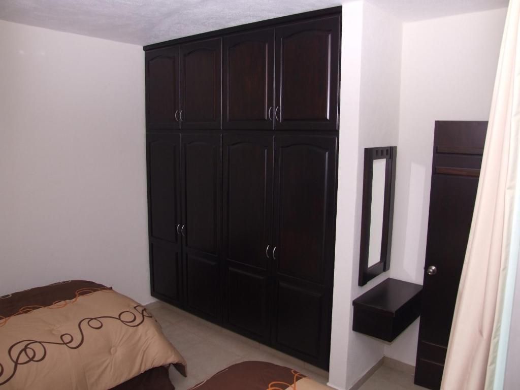 Postel nebo postele na pokoji v ubytování MR Hotel