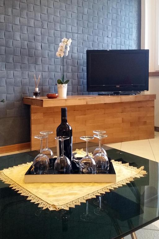 Televízia a/alebo spoločenská miestnosť v ubytovaní Villitaly suite & coffee Salerno