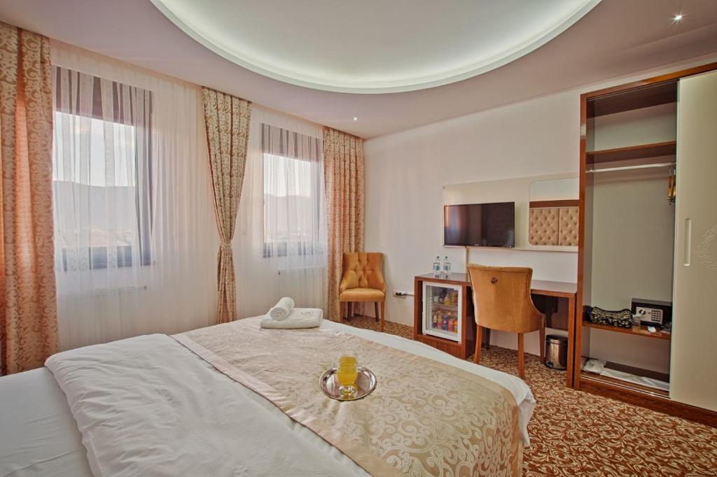 Postel nebo postele na pokoji v ubytování New Hotel