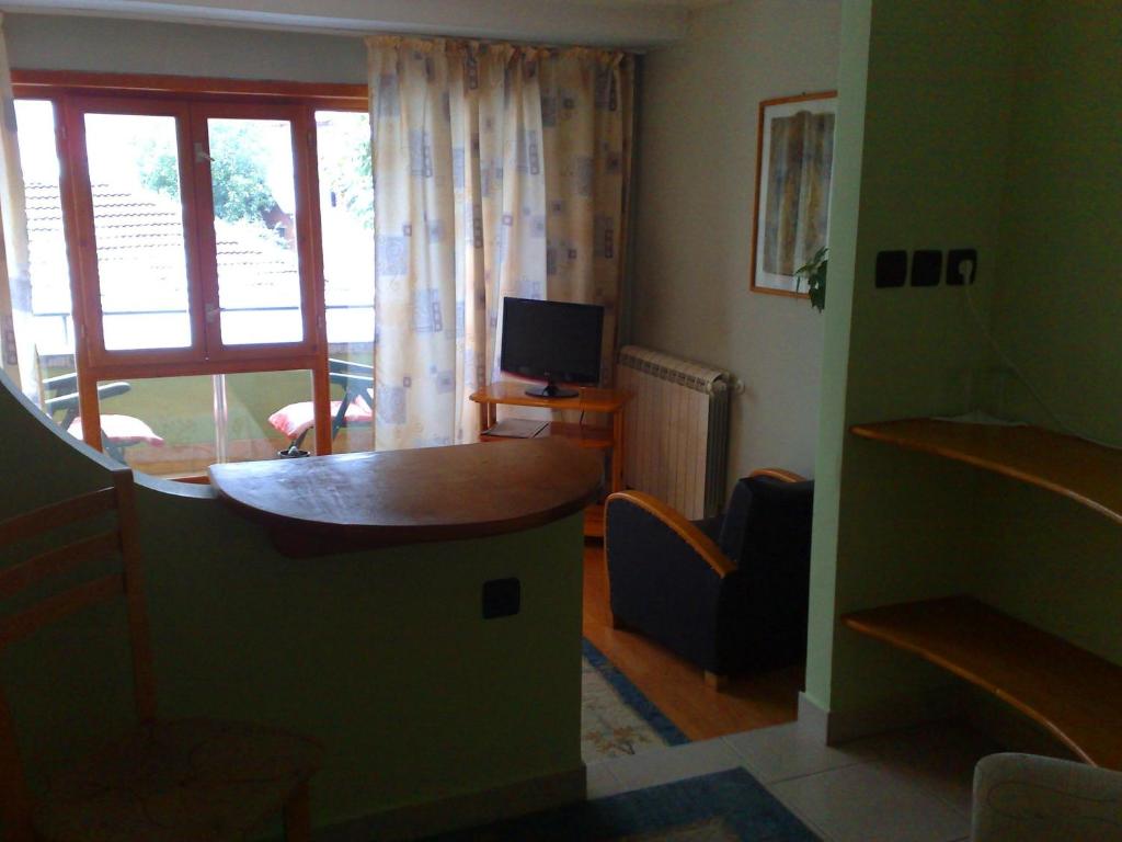 TV a/nebo společenská místnost v ubytování Family Hotel Sonata