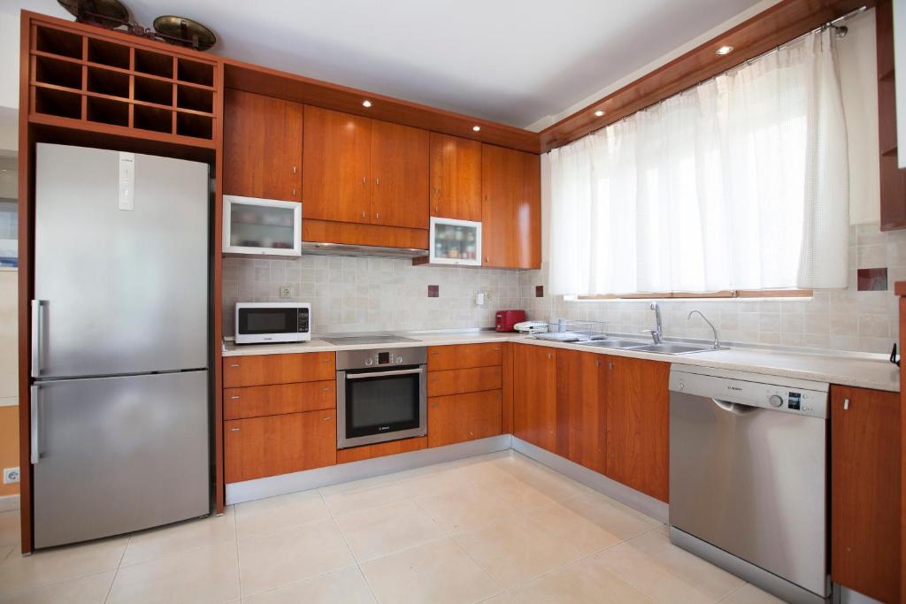 Kuchyň nebo kuchyňský kout v ubytování Sunny Rhodes Villa