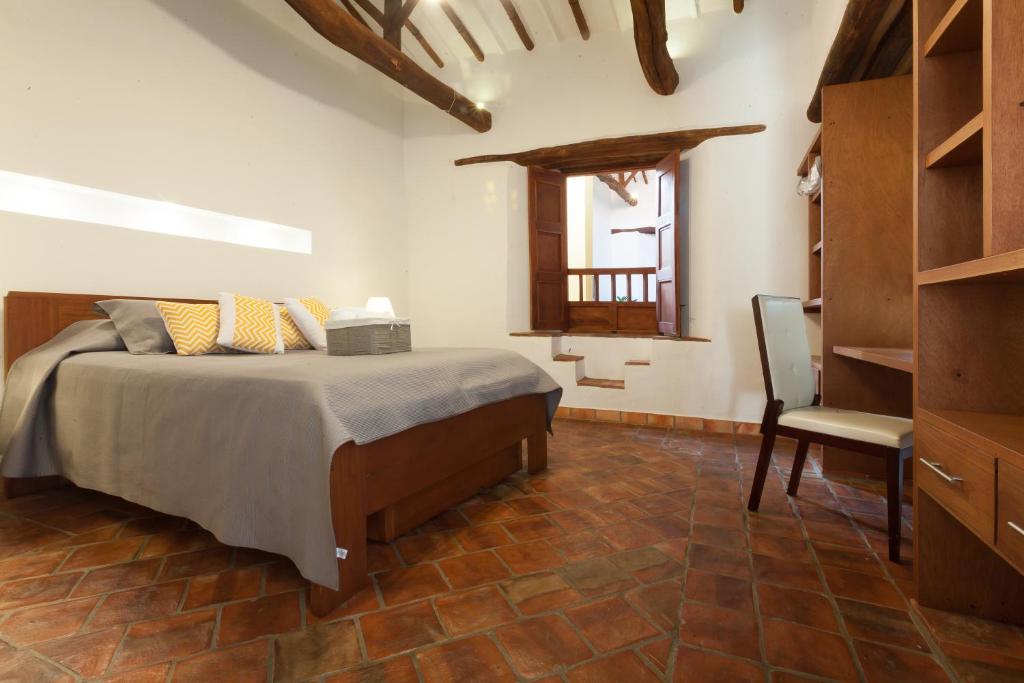 Postel nebo postele na pokoji v ubytování Casa Bari El Jardin