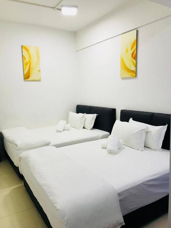 Postel nebo postele na pokoji v ubytování H-Hotel