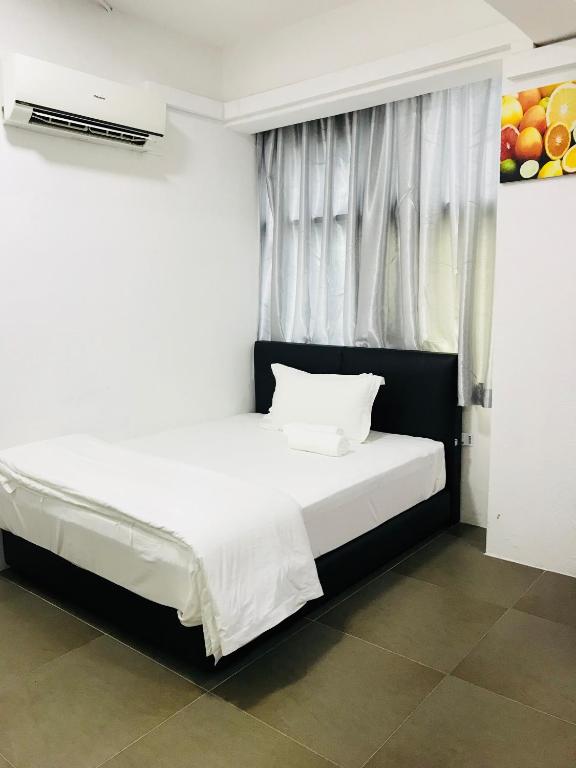 Postel nebo postele na pokoji v ubytování H-Hotel