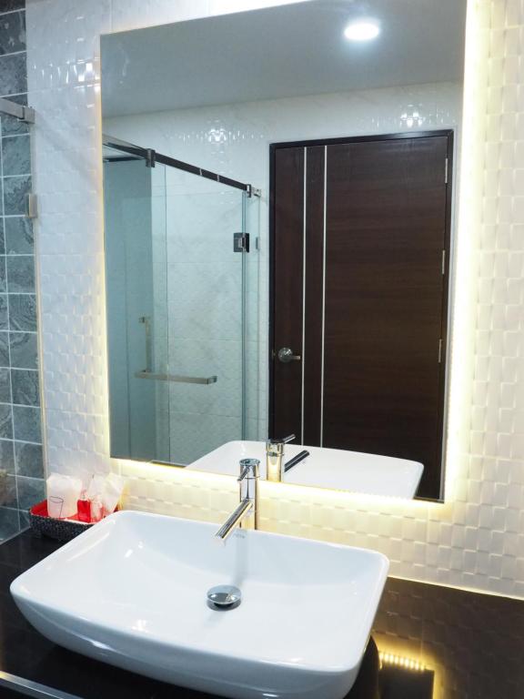 Koupelna v ubytování Samui City Hotel