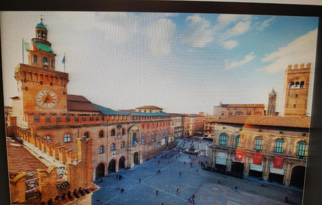 a view of a building with a clock tower at Ak Holidays Apartment 59 in Bologna