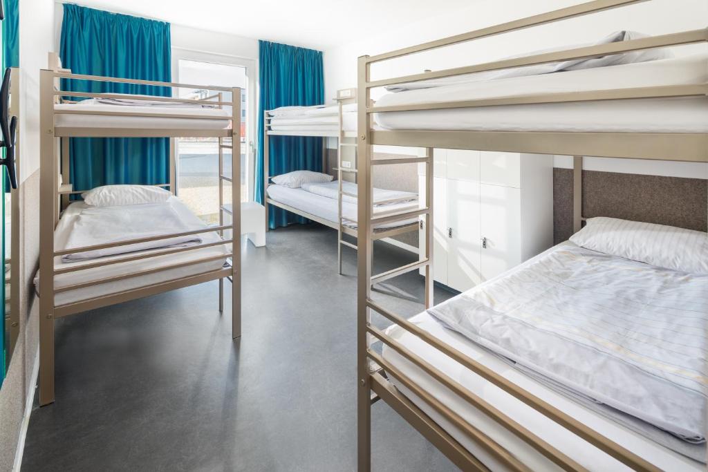 Postel nebo postele na pokoji v ubytování Haus KLIPPER Norderney