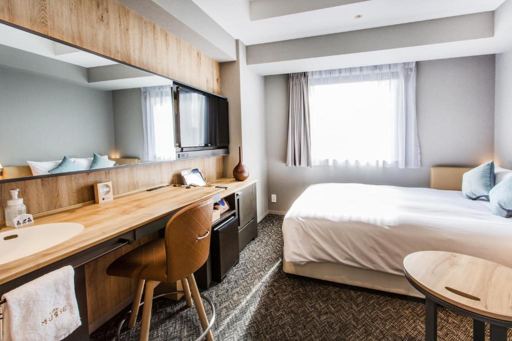 Cama ou camas em um quarto em Hotel Musse Ginza Meitetsu