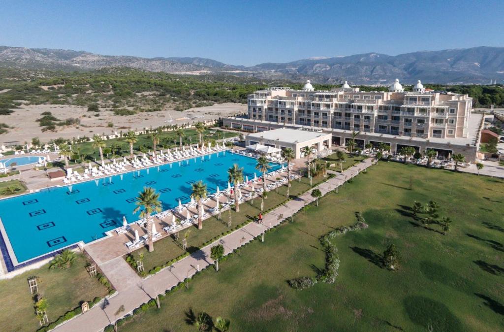 an aerial view of a resort with a large pool at Andriake Beach Club Hotel in Demre